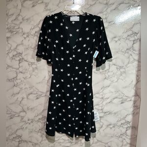 ASOS DESIGN button through tie back mini dress in mono star print